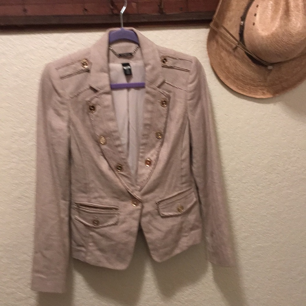 Tan jacket with gold buttons
